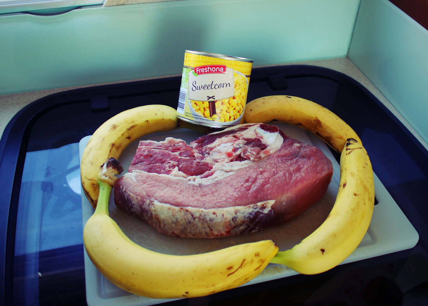 Rindfleisch mit Bananen-Mais Püree